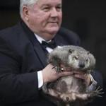 Inner Circle president Bill Deeley held Punxsutawney Phil on Monday. The Inner Circle group said Tuesday that Phil did not see his shadow, thus ?predicting? an early spring.